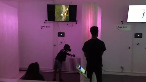 Virtual reality arcade VR World NYC bills itself as the largest VR experience Stock Footage 83550667