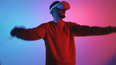 Virtual reality boxing game in neon color studio Vr games Video stock 143639650