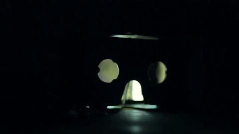 Virtual reality cardboard glasses on the table in the dark. Stock-Footage 88862545