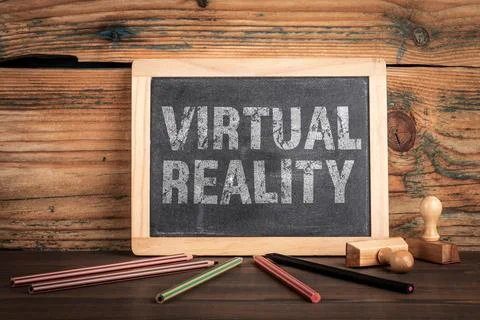 Virtual Reality Concept Written on Chalkboard with Creative Workspace Element Stock Photos