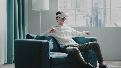Virtual reality developer tests new white headset smiling Video stock 154842075