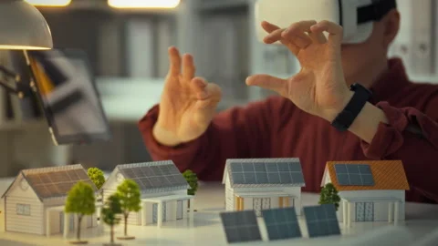 A virtual reality engineer creates innovative projects using solar panels. A Stock Footage 331297811