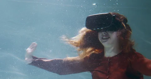 Virtual reality experience. Beautiful young happy woman is excited using VR Stock Footage 154172305