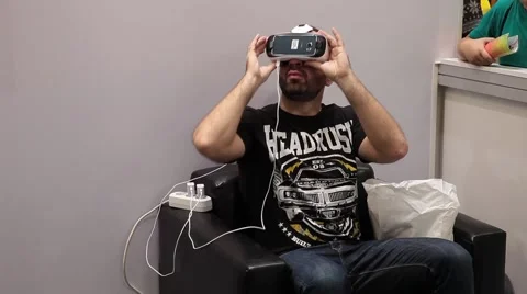 Virtual reality game. Man using with virtual reality glasses Stock Footage 61093294