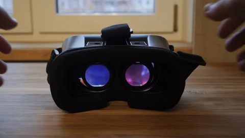 Virtual reality glasses are on the table. Video stock 143948331