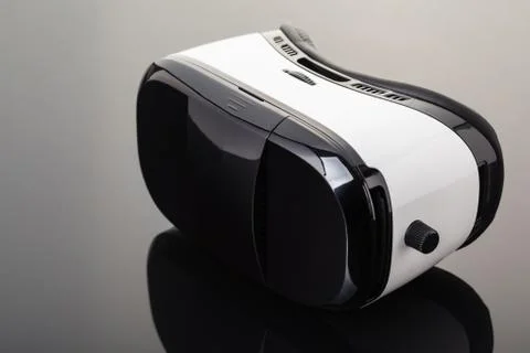 Virtual reality glasses on black surface Stock Photos