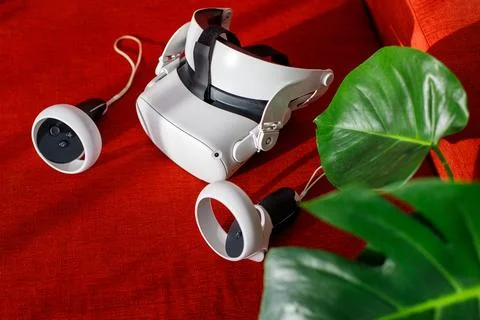 Virtual reality glasses on the sofa. spending time at home Stock-Fotos