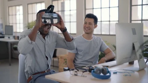 Virtual reality goggles in start up office Stock Footage 71628829
