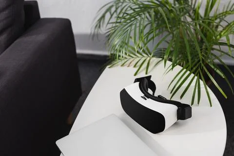 Virtual reality headset closed notebook Stock Photos