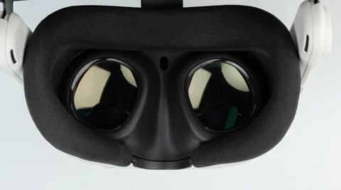 Virtual reality headset displayed on clean surface with clear lenses ready .. Stock Photos