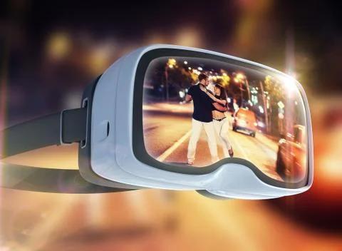Virtual reality headset, double exposure. Young couple dancing tango on the q Stock Photos