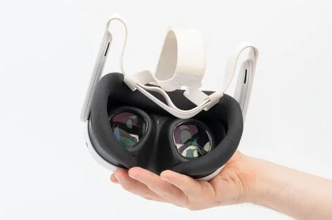 Virtual reality headset in hand palm Stock Photos