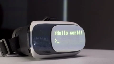 Virtual reality headset with Hello World code displayed on screen Stock-Footage 334137092