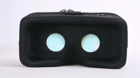 Virtual reality headset on the table. Blue lenses. Stock Footage 89002285