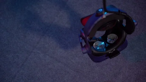 Virtual reality helmet. The virtual reality helmet hangs on the wire. Stock Footage 155032396