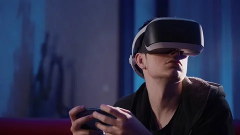 Virtual Reality Man using Smartphone and enjoying VR Stock-Footage 258553633