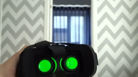 Virtual reality mask. Close up. A virtual reality headset affords an immersive Stock Footage 73986836