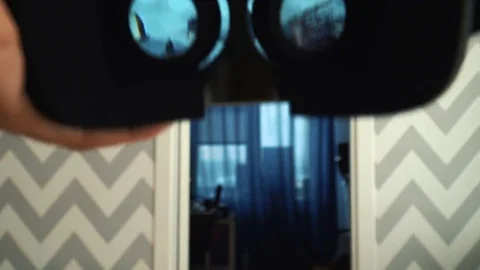 Virtual reality mask. Close up. A virtual reality headset affords an immersive Stock Footage 73986891