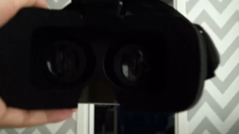 Virtual reality mask. Close up. A virtual reality headset affords an immersive Stock Footage 73987055