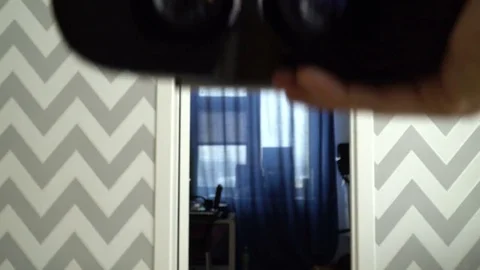 Virtual reality mask. Close up. A virtual reality headset affords an immersive Stock Footage 73988856