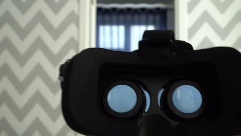 Virtual reality mask. Close up. A virtual reality headset affords an immersive Stock Footage 73989134