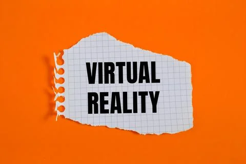 Virtual reality message written on ripped torn checkered graph paper piece .. Stock Photos