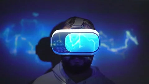 Virtual reality programming concept. vr goggles with lightning projection. Stock Footage 165808130