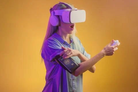 Virtual reality technology headset glasses. Latin futuristic cyberpunk female in Stock Photos