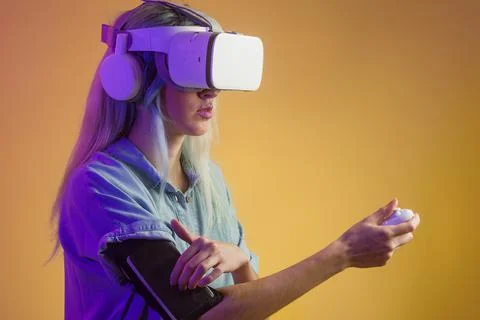 Virtual reality technology headset glasses. Latin futuristic cyberpunk female in Stock Photos