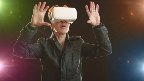 Virtual Reality User Swiping Through Air in High-Tech Simulation Stock Footage 263462694