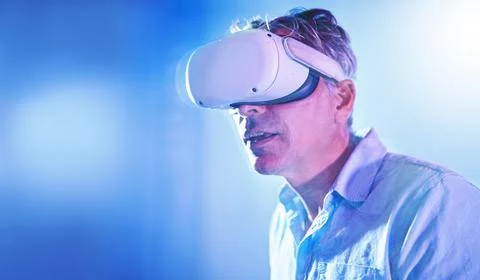 Virtual reality, vr metaverse or senior man with 3d goggles for virtual lights 스톡 사진