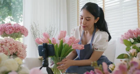 Virtual remotely sell digital SME retail business flower shop at home. Stock Footage 164057216