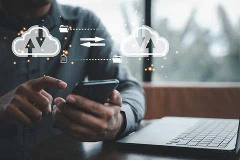 Virtual screen with cloud computing diagram displayed by a man 写真素材