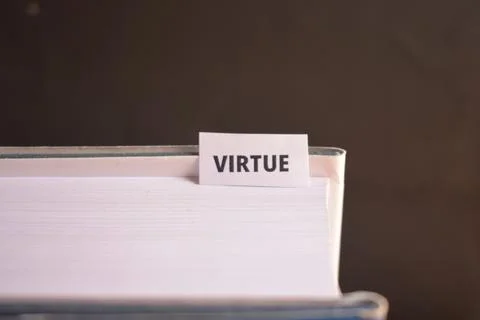 Virtue Paper Tab Between Book Pages for Integrity, Wisdom and Personal Values Stock Photos