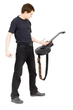 Virtuoso guitarist, dressed in black Stock Photos