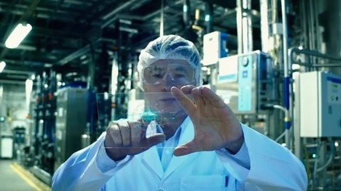 Virus alert concept. Scientist using futuristic tablet with virus alert on the Stock Footage 125558102