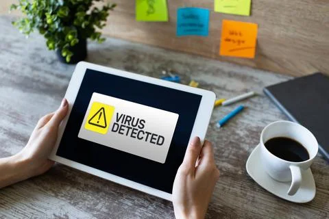 Virus Detected warning message on screen. Cyber security breach. Data protection Stock Photos