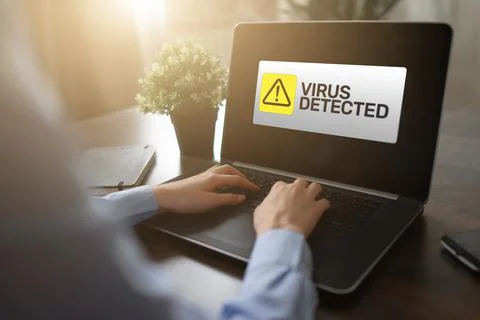 Virus Detected warning message on screen. Cyber security breach. Data protection Stock Photos