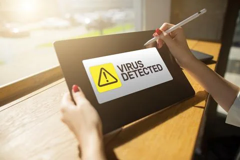 Virus Detected warning message on screen. Cyber security breach. Data protection 库存照片