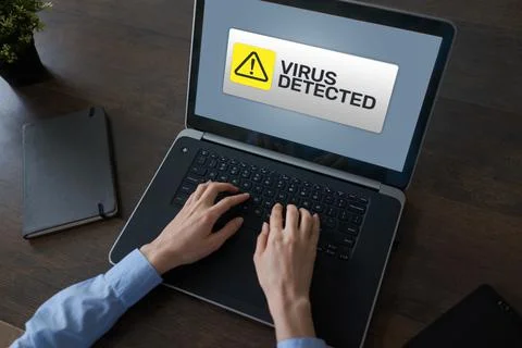 Virus Detected warning message on screen. Cyber security breach. Data protection Stock Photos