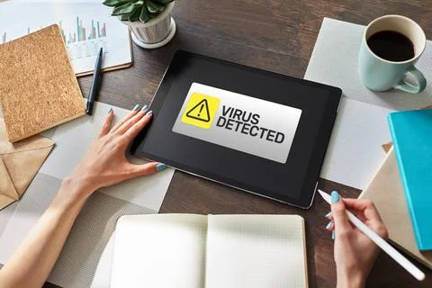 Virus Detected warning message on screen. Cyber security breach. Data protection Stock Photos