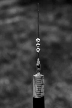 Virus HIV on the needle Stock Photos