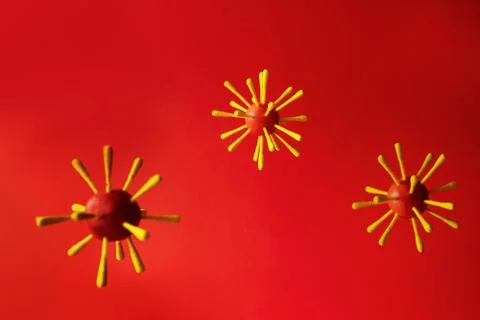Virus model on red background Stock Photos
