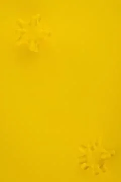 Virus molecules on yellow background with copy space. Stock Photos