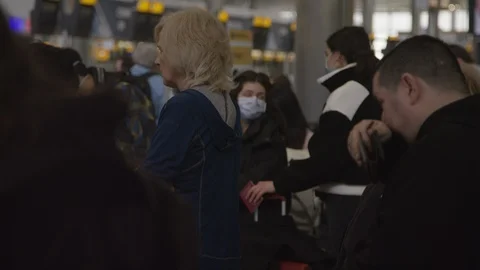 Virus outbreak as people try to fly home from Heathrow Stock Footage 126352828