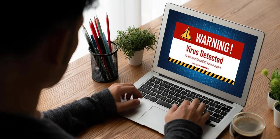 Virus warning alert on computer screen detected modish cyber threat Stock Photos