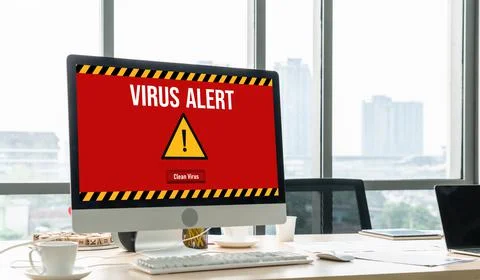 Virus warning alert on computer screen detected modish cyber threat Stock Photos