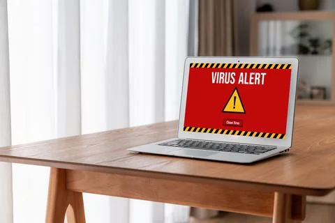 Virus warning alert on computer screen detected modish cyber threat Stock Photos