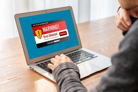 Virus warning alert on computer screen detected modish cyber threat 写真素材