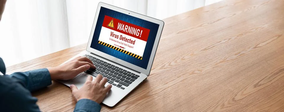 Virus warning alert on computer screen detected modish cyber threat Stock Photos